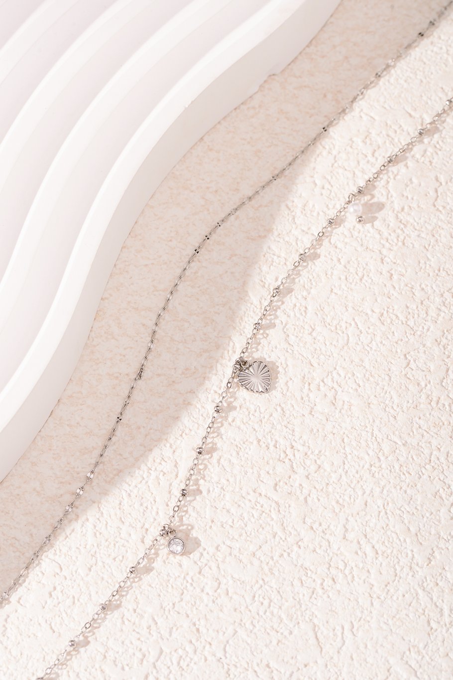 Ketting met hartje, parel en diamantje, perfect om liefde en stijl te combineren in één sieraad